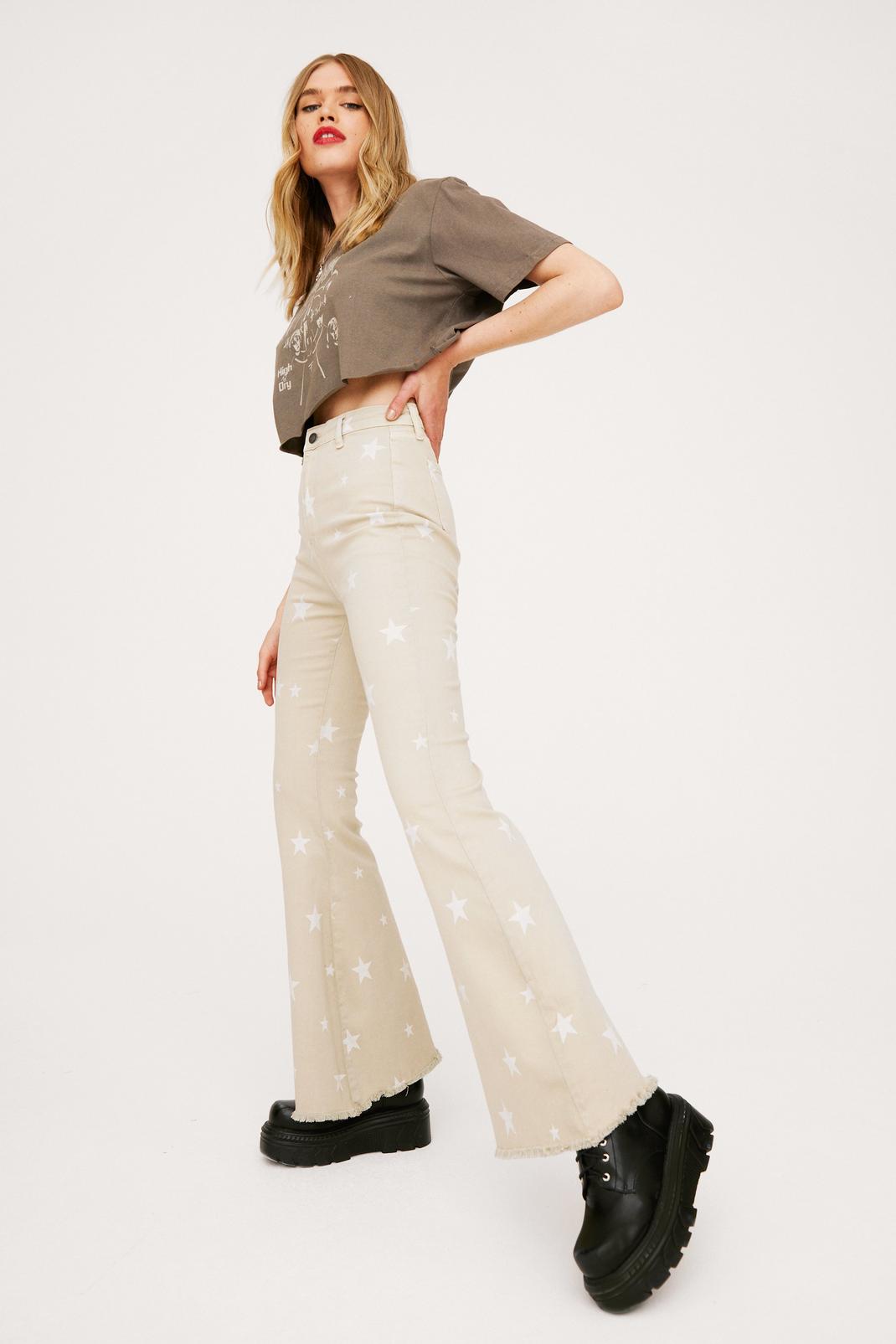 Stone High Waisted Star Print Flare Jeans image number 1