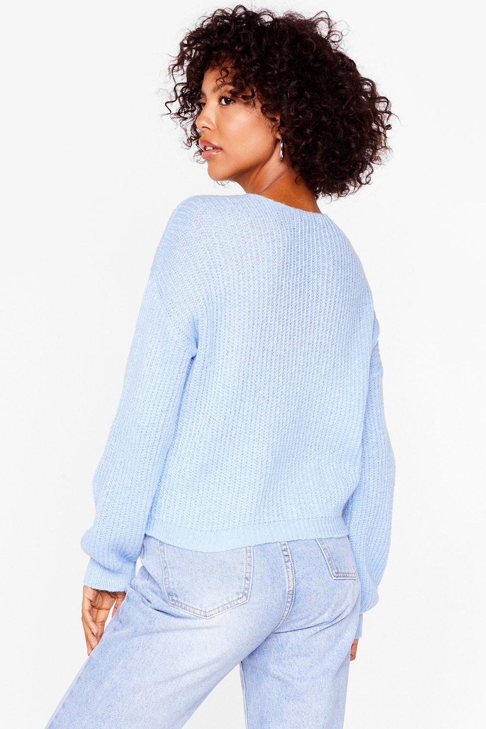 Plunging v neck on sale sweater