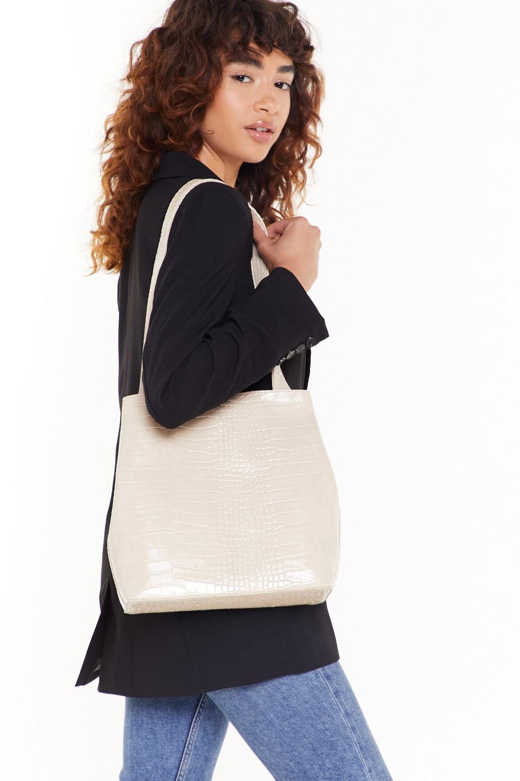 WANT Wait for the Reveal Croc Clutch and Tote Bag image number 1