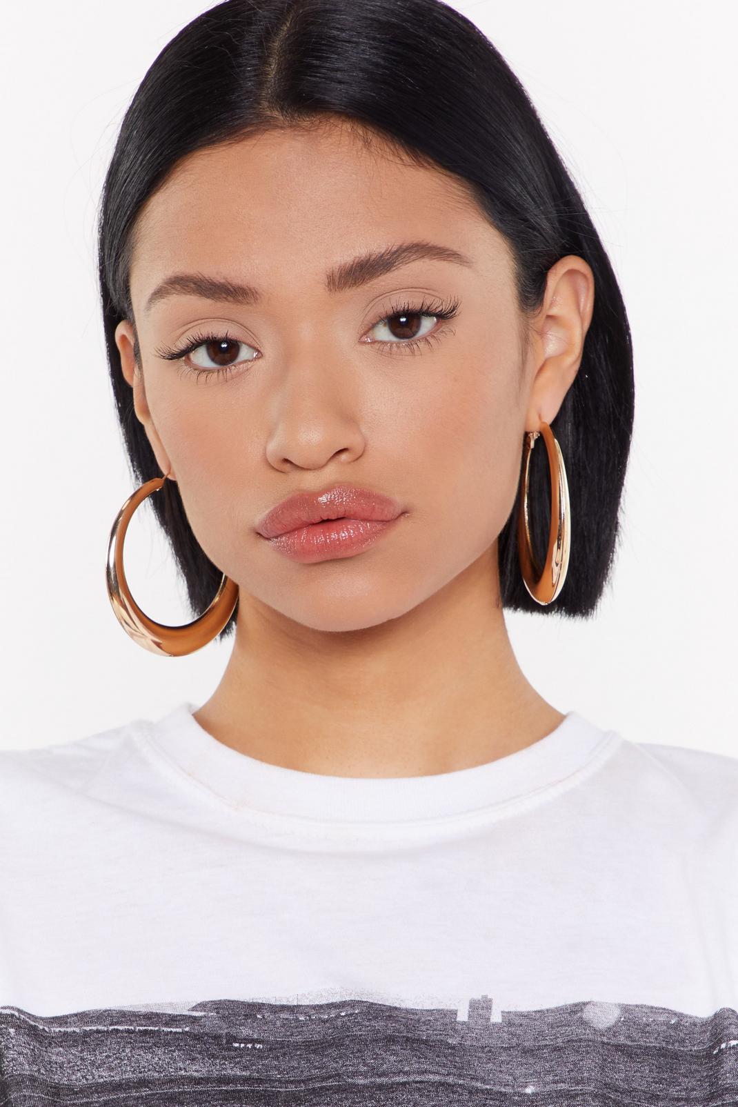 Gold Jumping Through Hoops Oversized Earrings image number 1