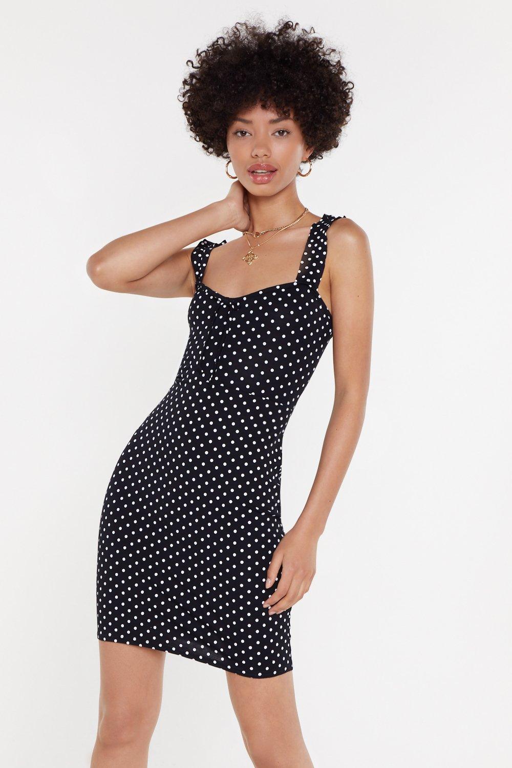 black polka dot mini dress