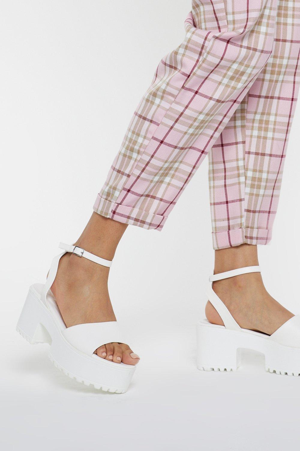 white cleated platform sandals