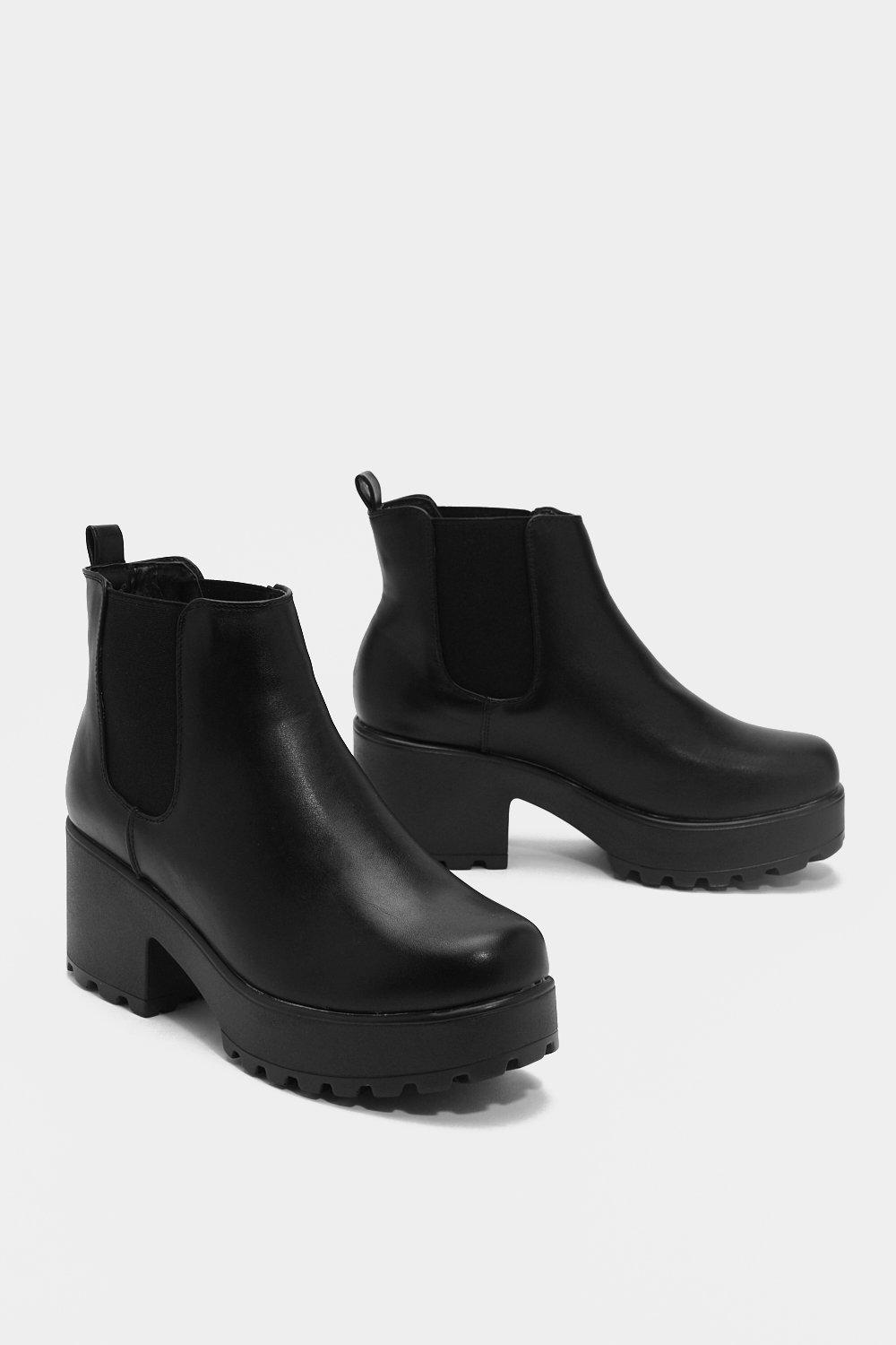 black shiny platform boots