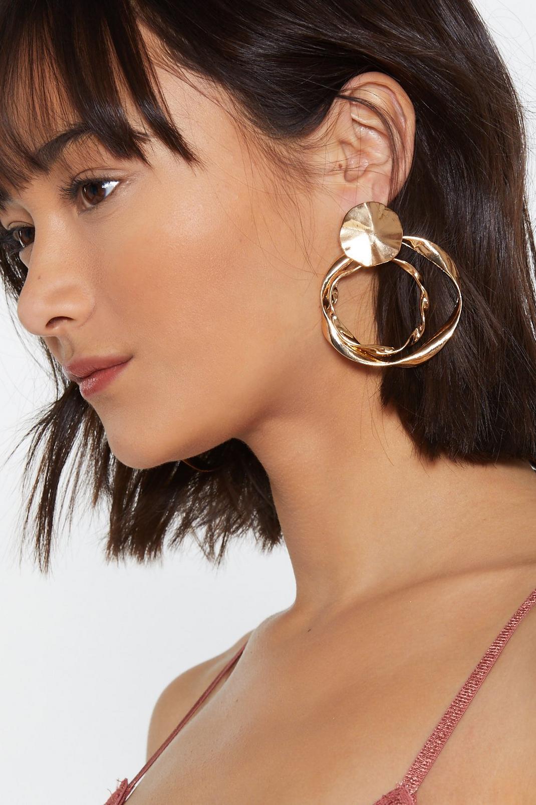 Here's the Twist Circle Earrings image number 1