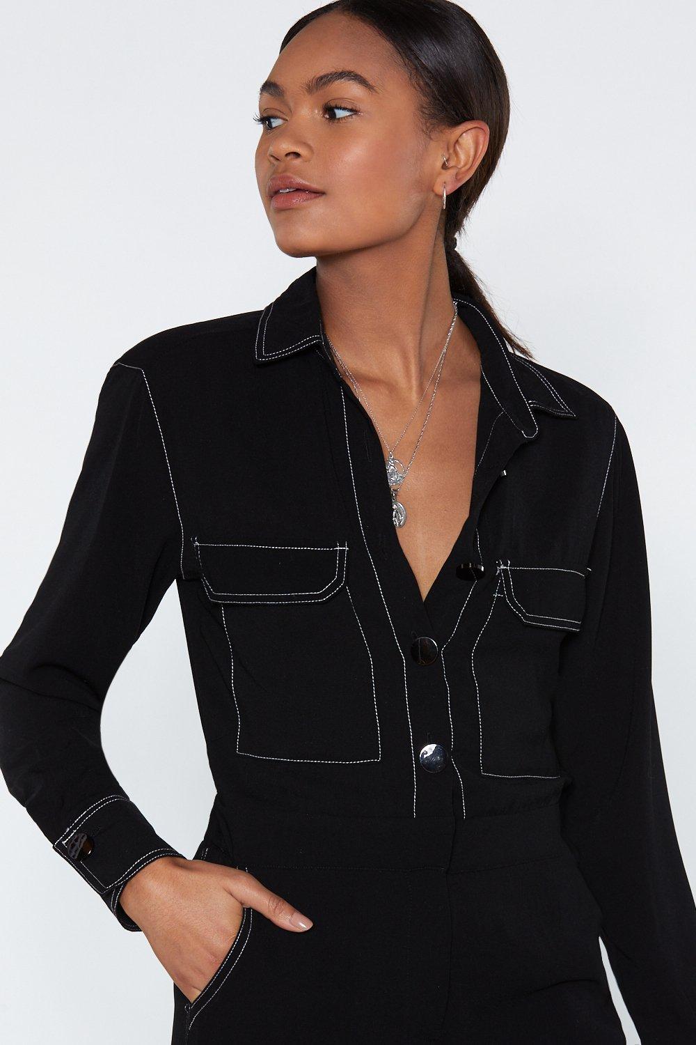 Black jumpsuit with store white stitching