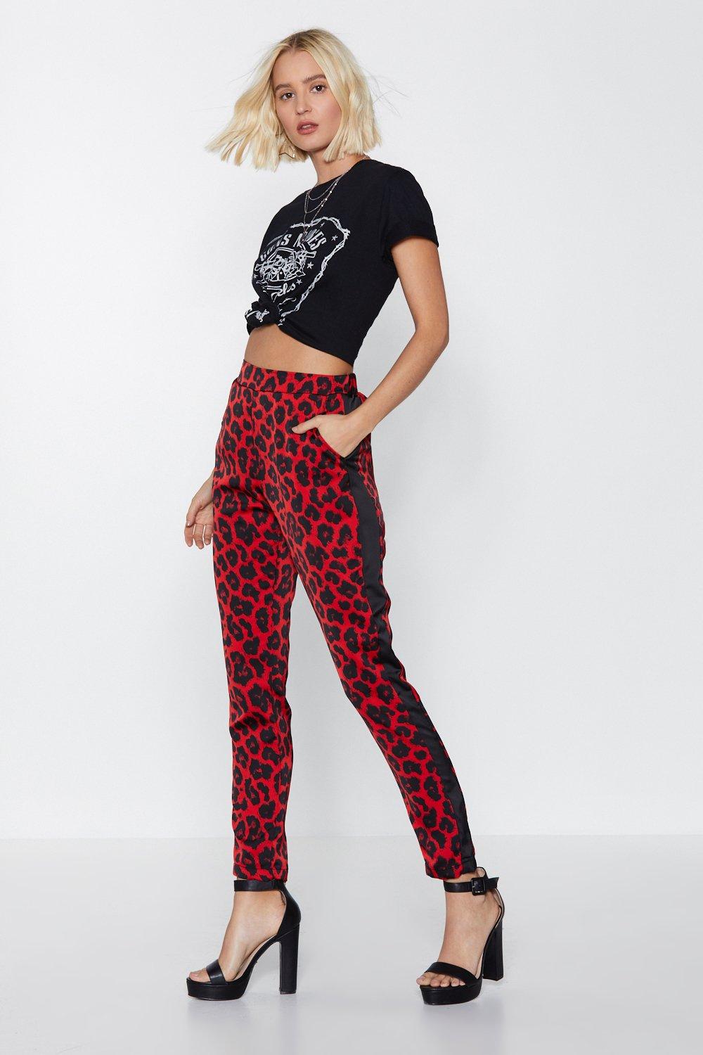 leopard print trousers with red stripe