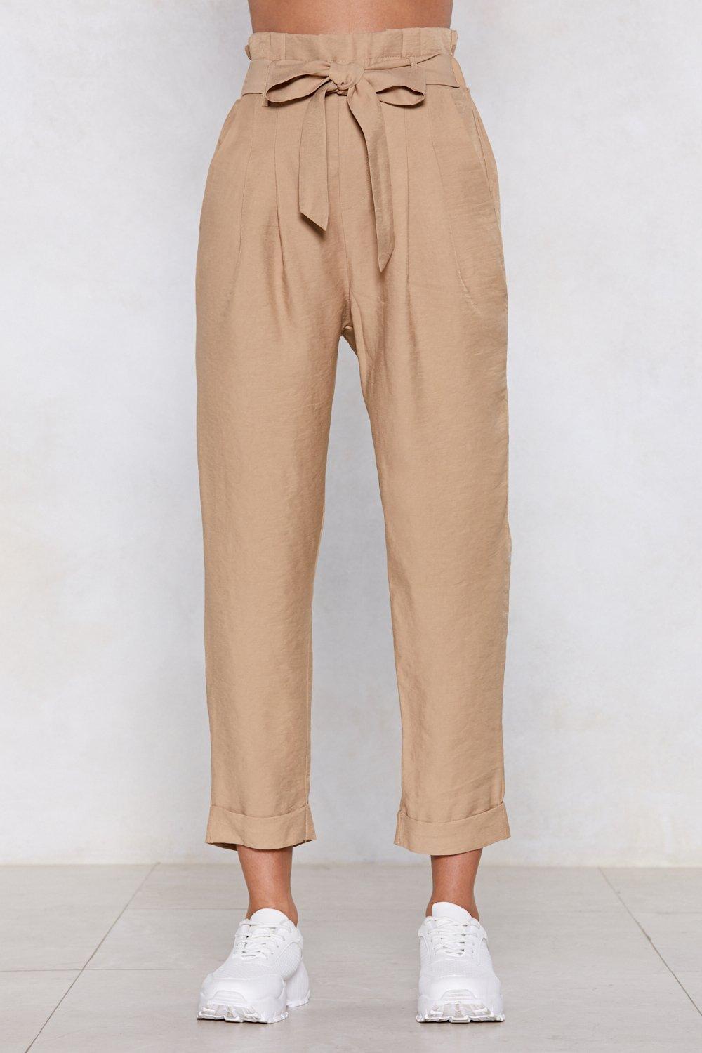 Dark green fitted linen pants with paper bag waist