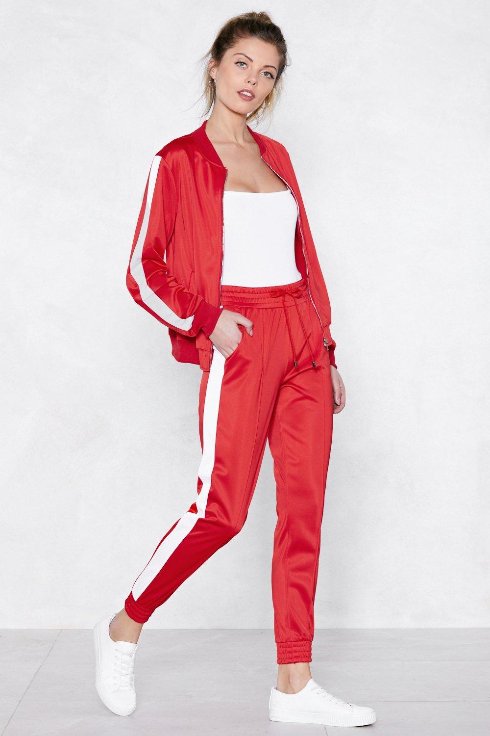 red jogger pants with white stripe