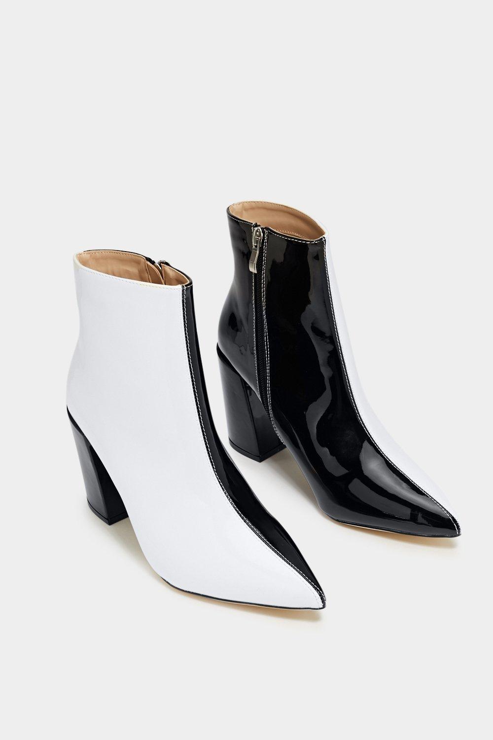 Nasty gal black 2025 and white boots