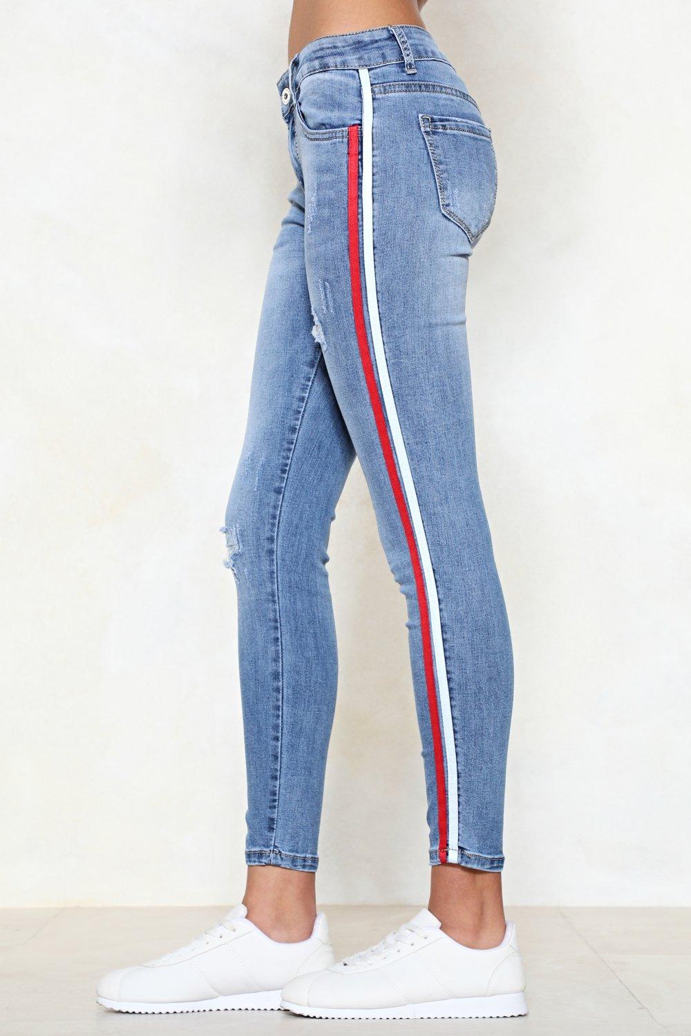 Jeans with a 2025 stripe down the side