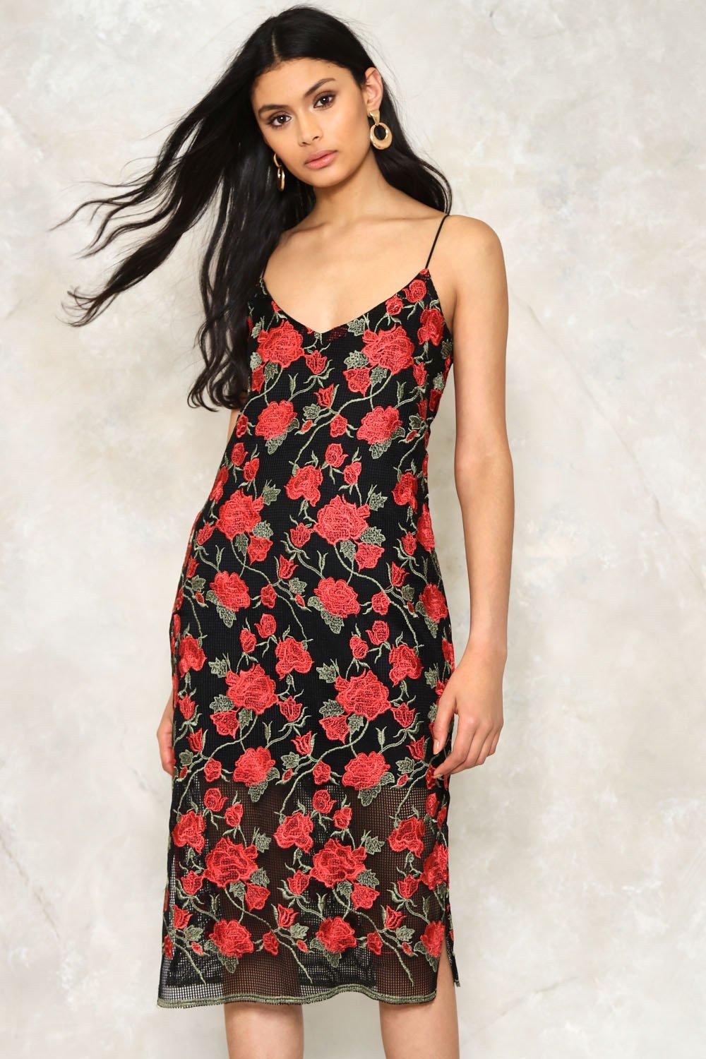 black dress with embroidered roses