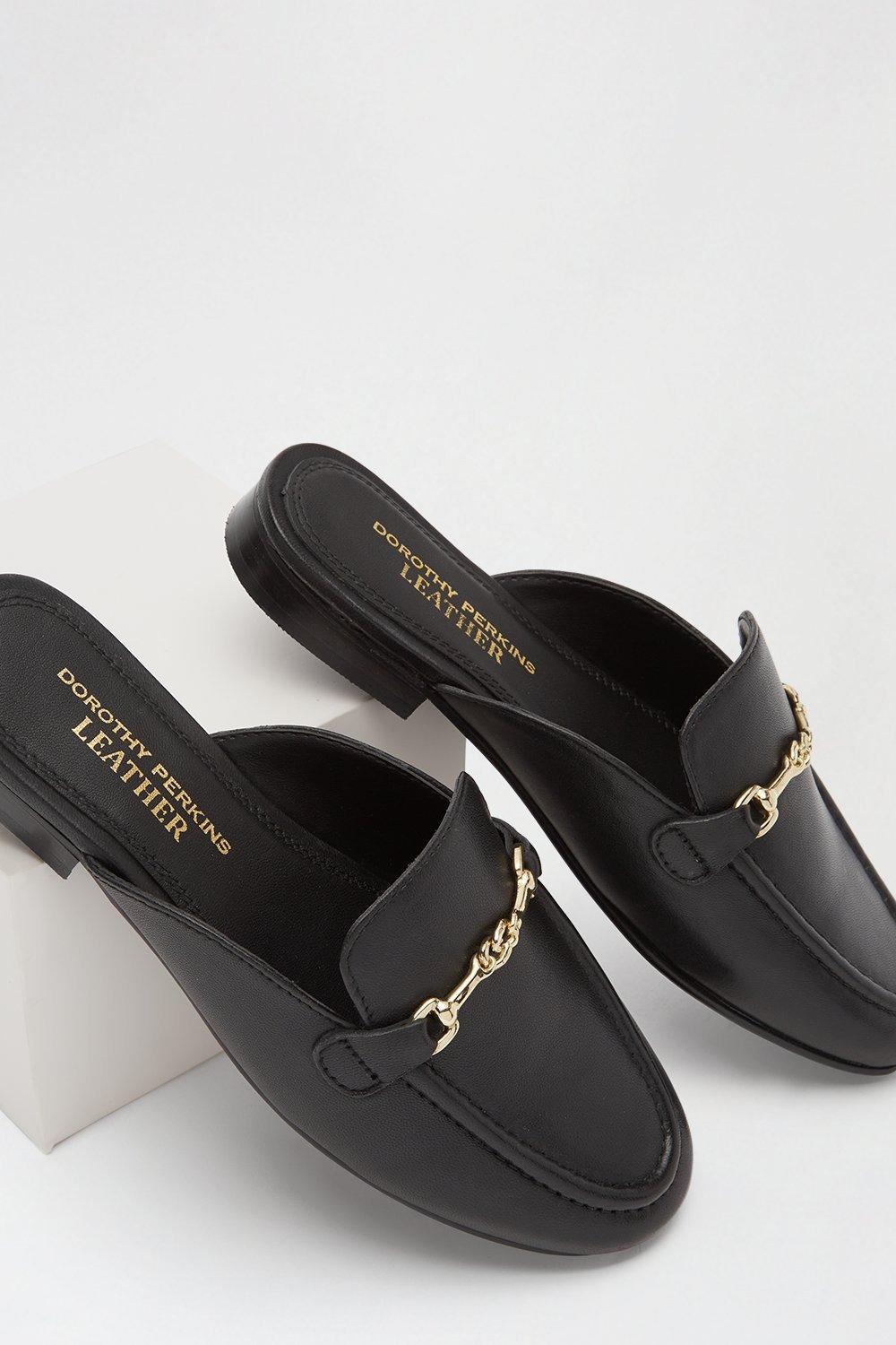 black backless loafers