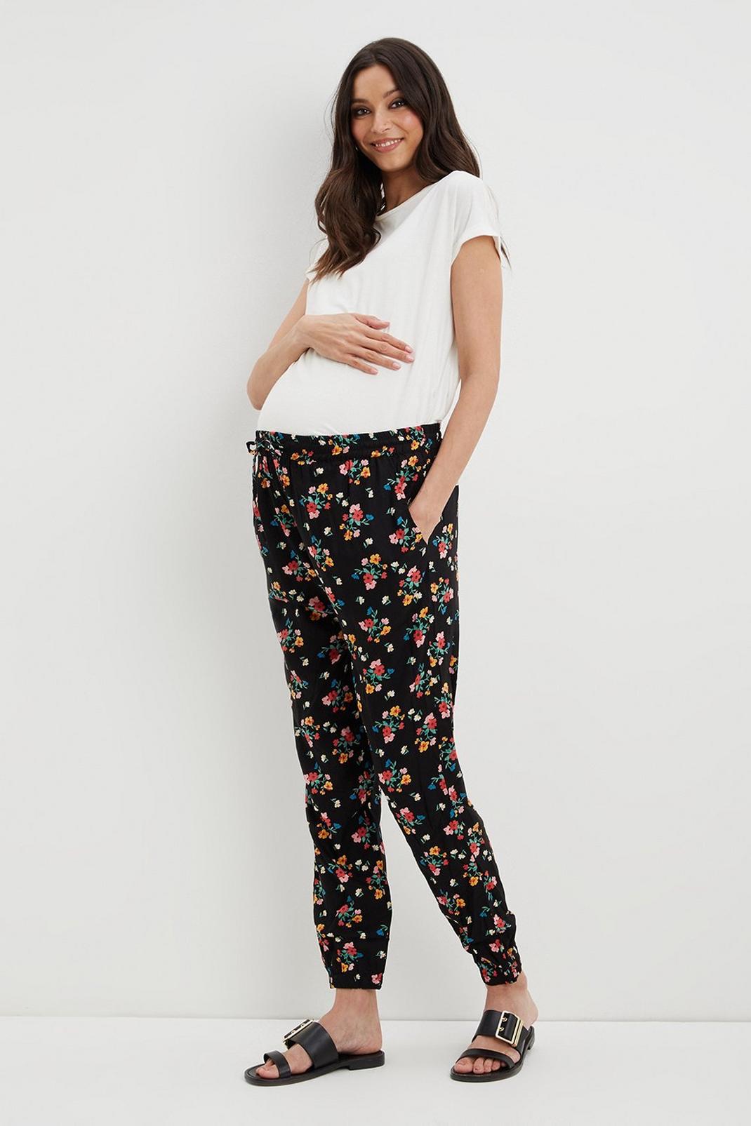 Maternity Pink Floral Print Woven Joggers image number 1