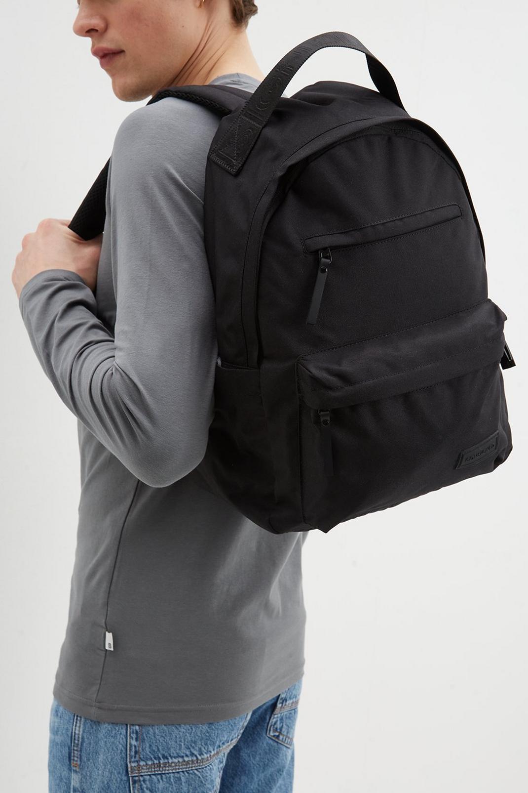 Black Consigned Zip Front Pocketed Backpack image number 1