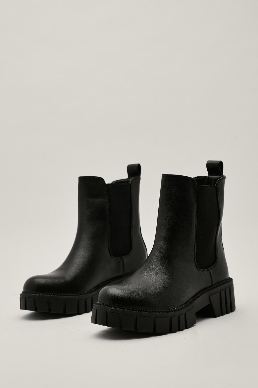 Black Faux Leather Staggered Cleat Chelsea Boot image number 1