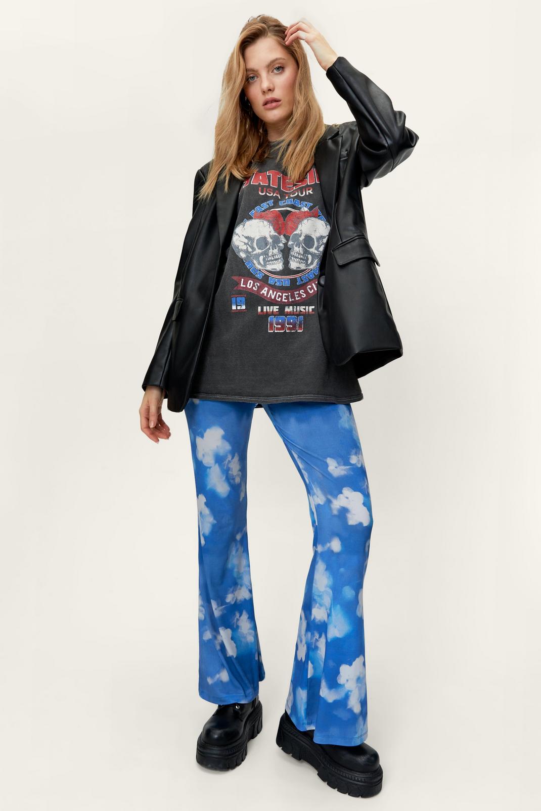 Blue Blurred Floral Print High Waisted Flared Trousers image number 1