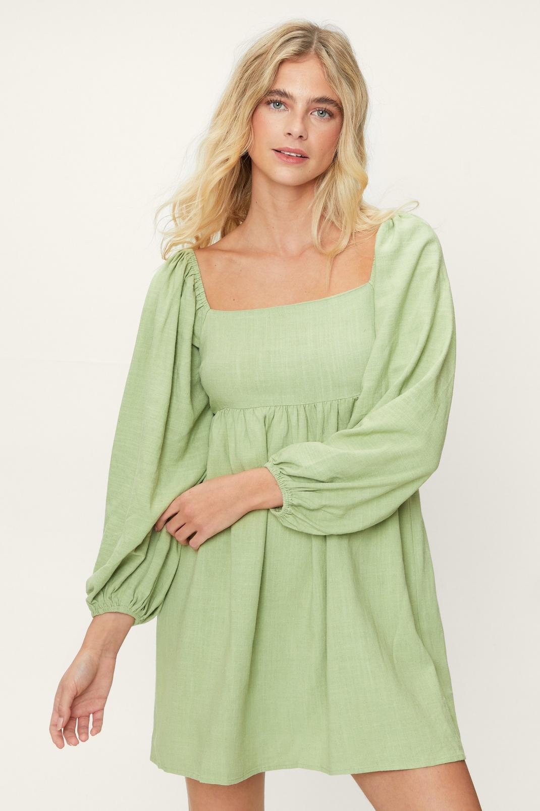Green Linen Smocked Babydoll Long Sleeve Mini Dress image number 1