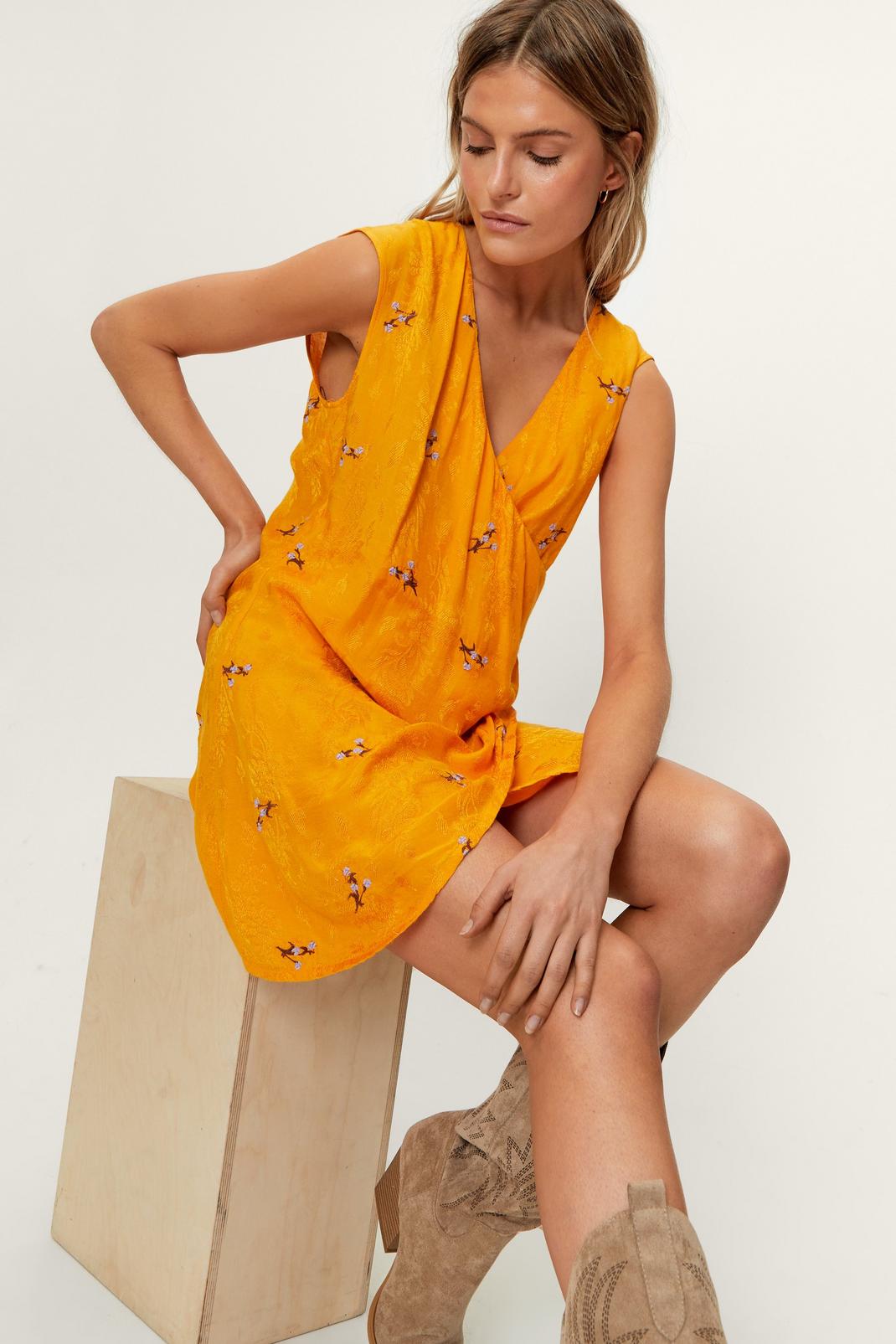 Yellow Floral Embroidery Detail Wrapover Mini Dress image number 1