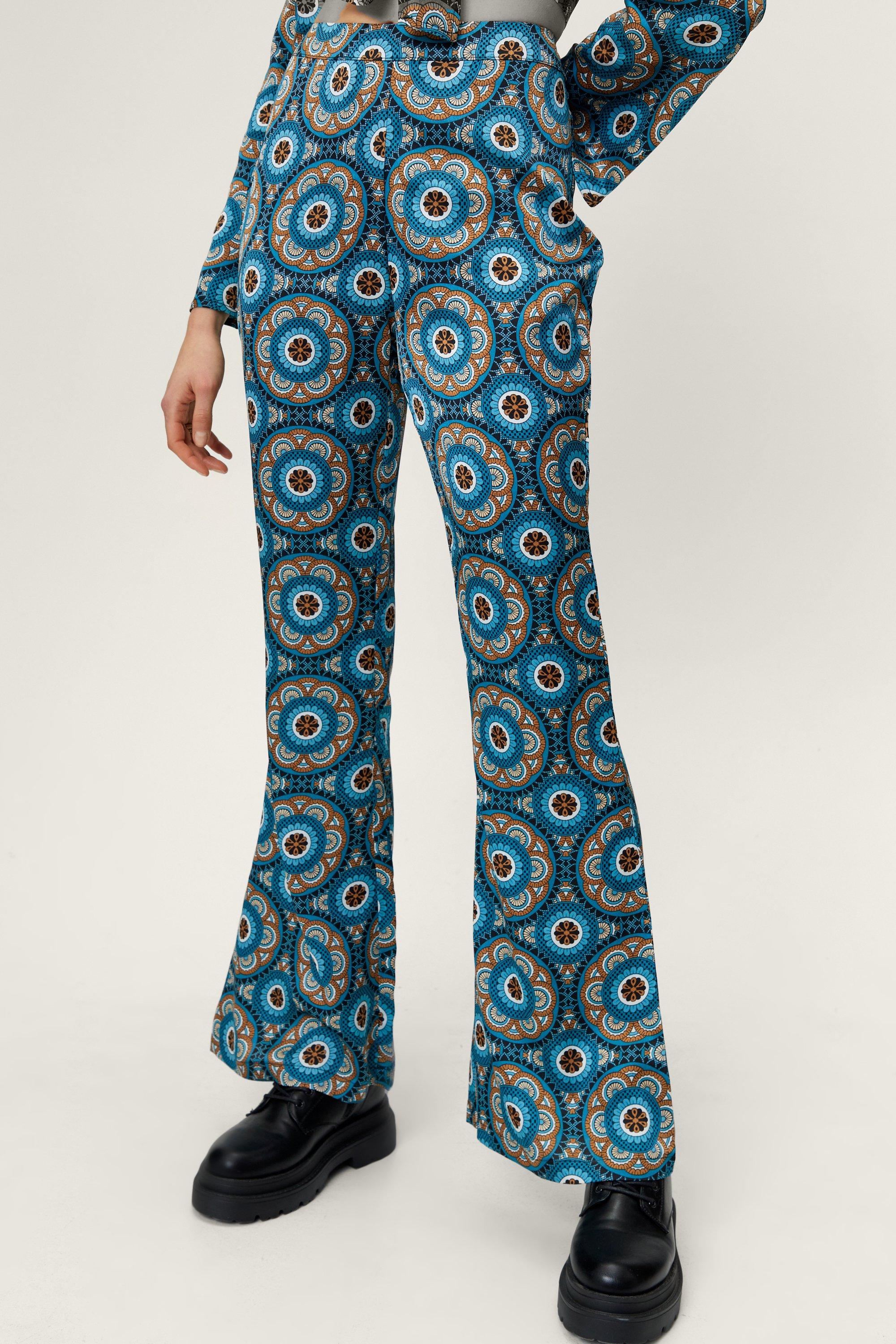 https://media.nastygal.com/i/nastygal/bgg02018_blue_xl_1/blue-retro-print-wide-leg-pants