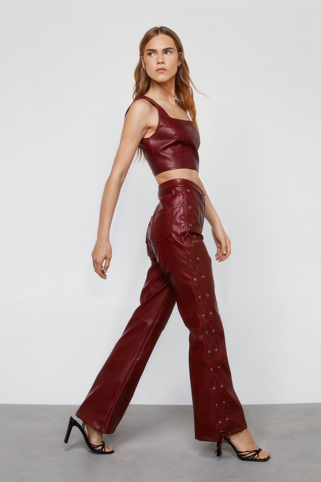 Oxblood Faux Leather Lace Up Flared Pants image number 1
