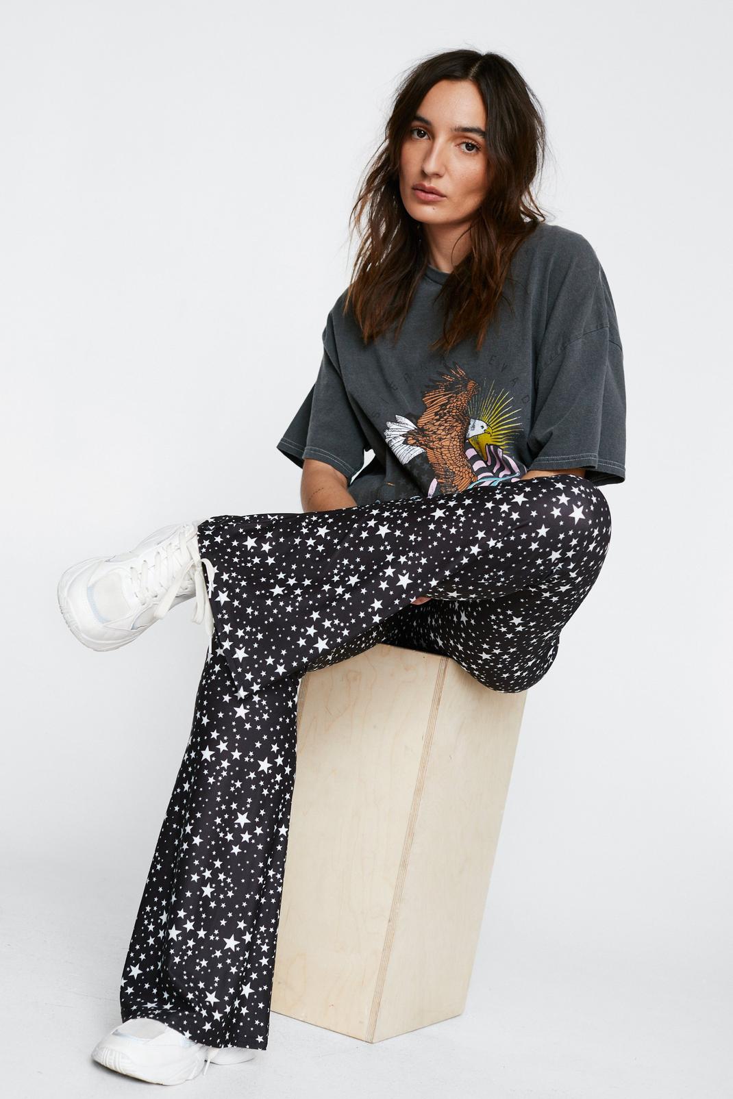 808 Petite Recycled Star Printed Flared Pants image number 1