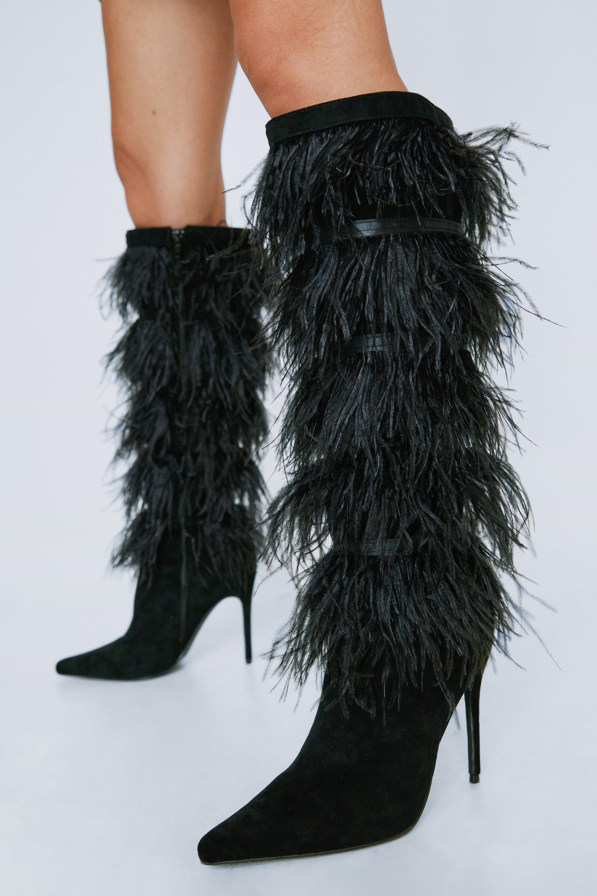 Feather thigh store high boots