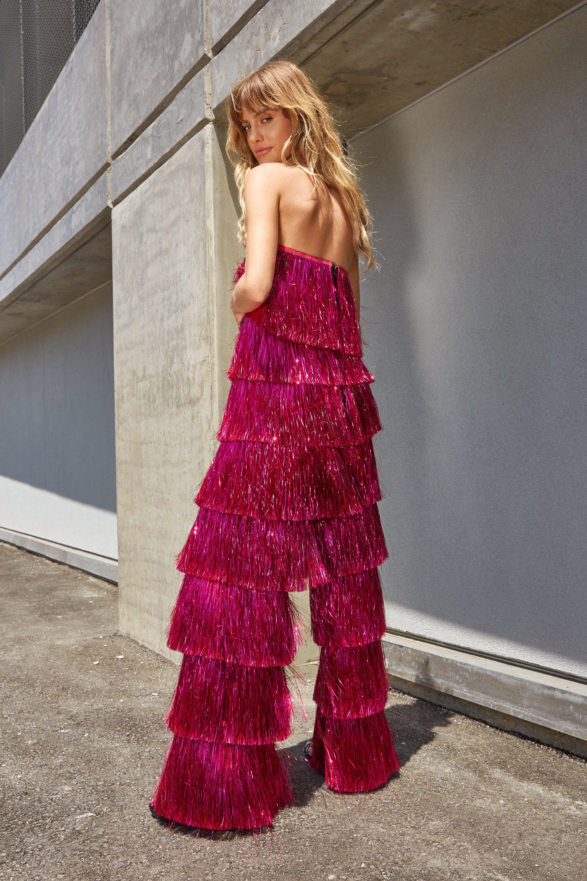 Red ruffles will turn heads in a bandeau jumpsuit.