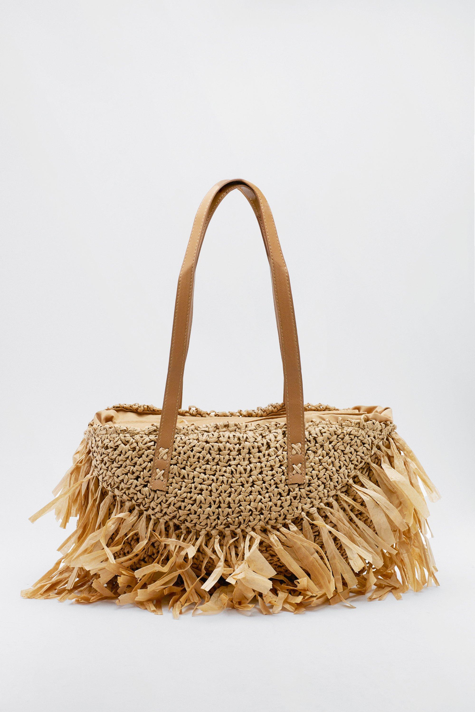 Fringe discount straw bag