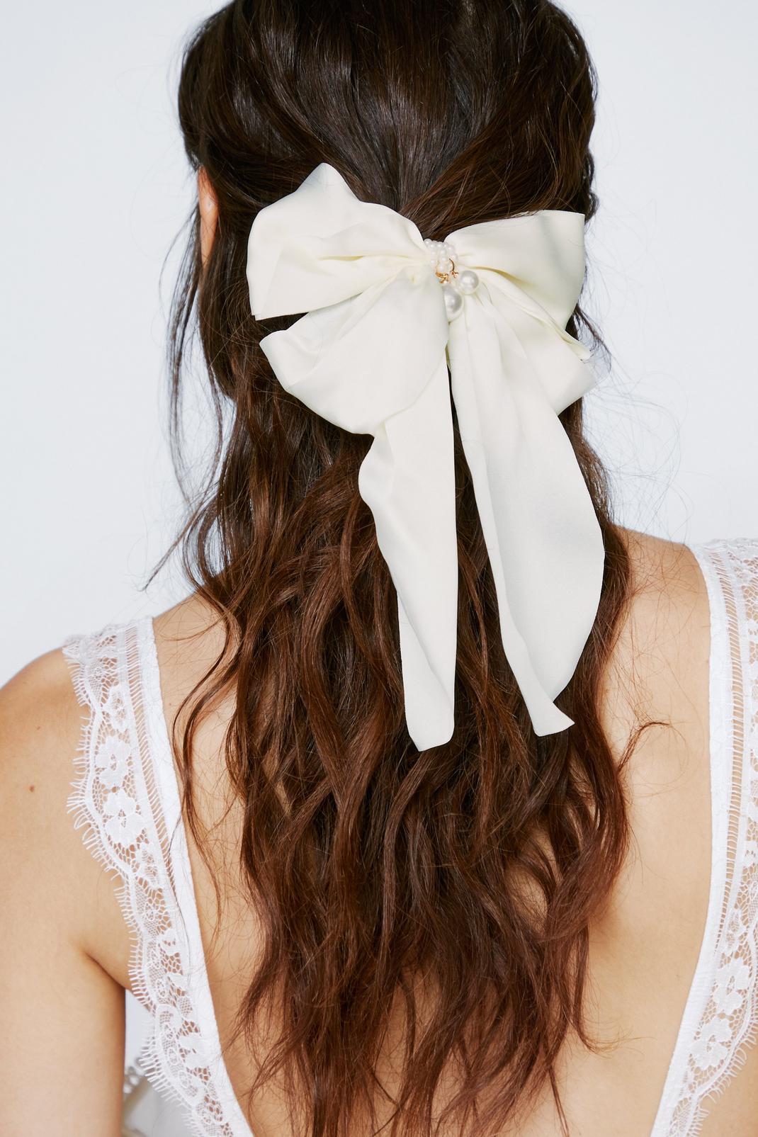 Cream Pearl Trimmed Hair Bow image number 1