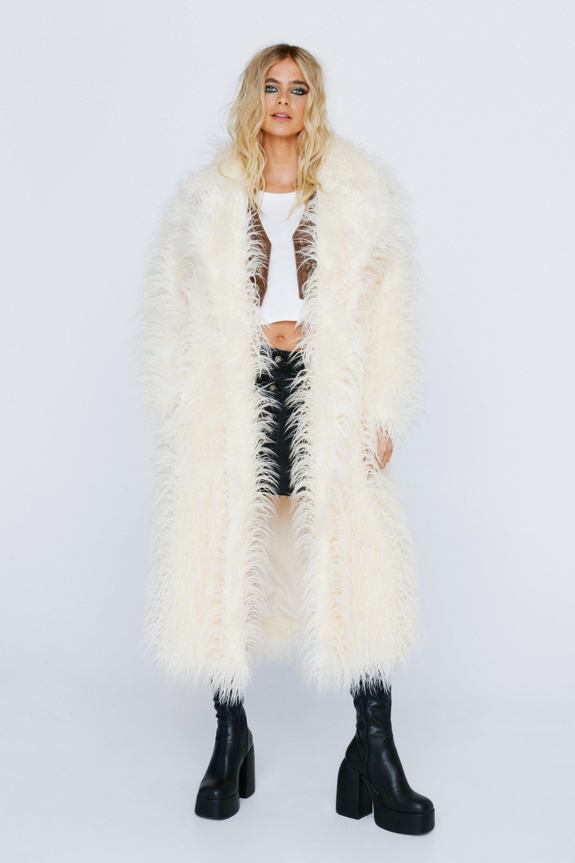 white fuzzy fur coat