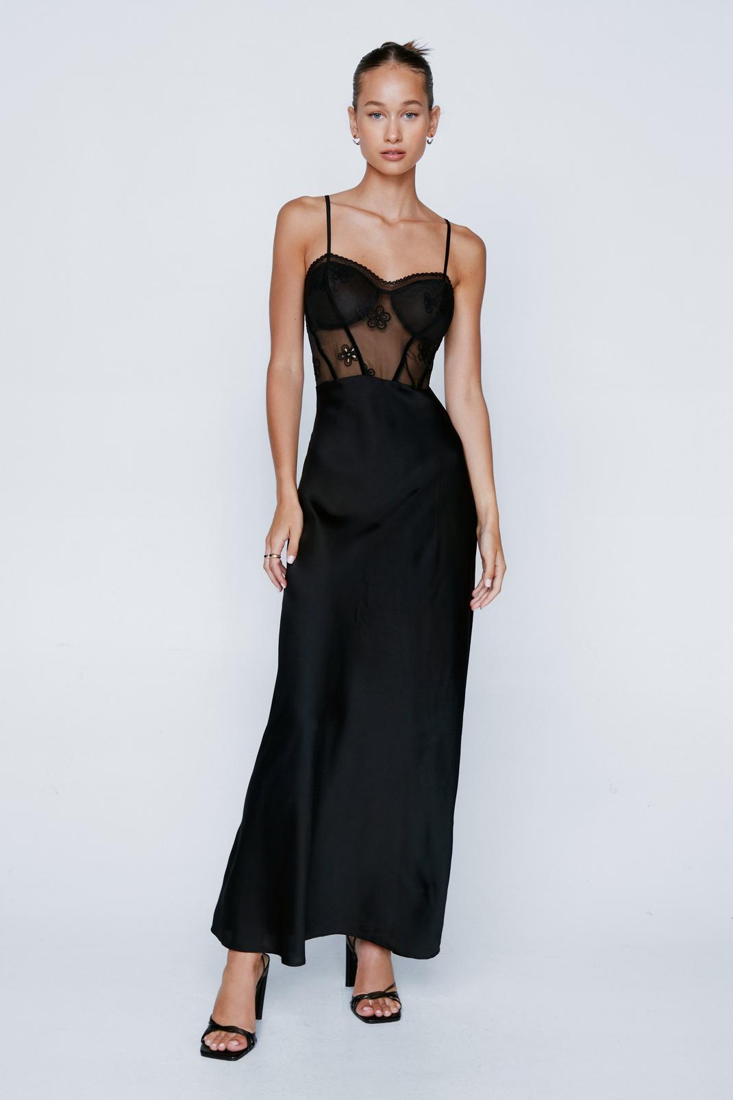 https://media.nastygal.com/i/nastygal/bgg10115_black_xl/female-black-sheer-embroidered-corset-satin-maxi-dress/?w=1070&qlt=default&fmt.jp2.qlt=70&fmt=auto&sm=fit