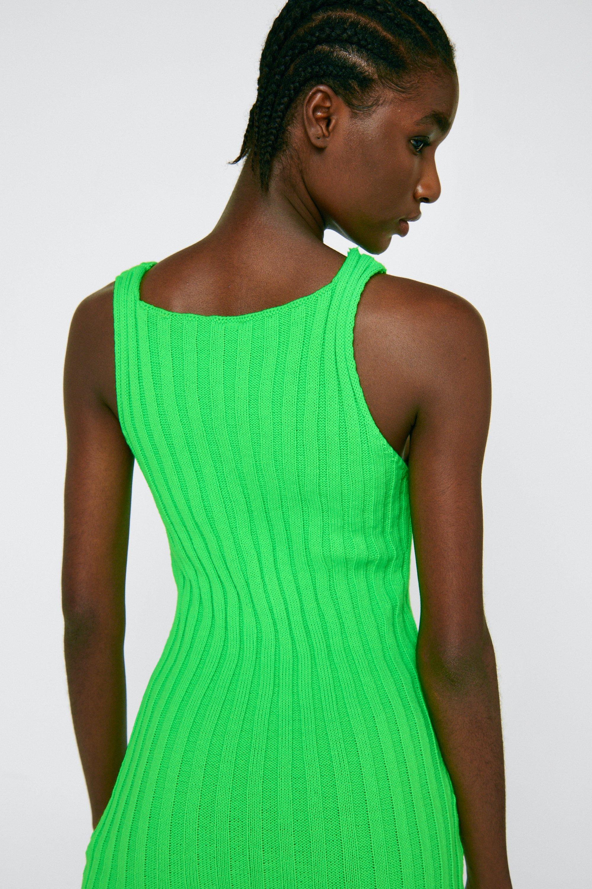 Green sleeveless dress with asymmetric hem