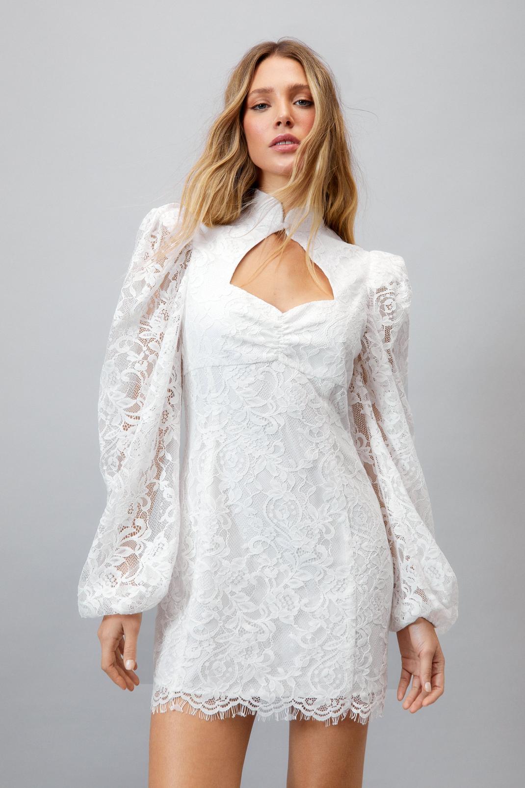 Ivory Lace Cut Out Puff Sleeve Mini Dress image number 1