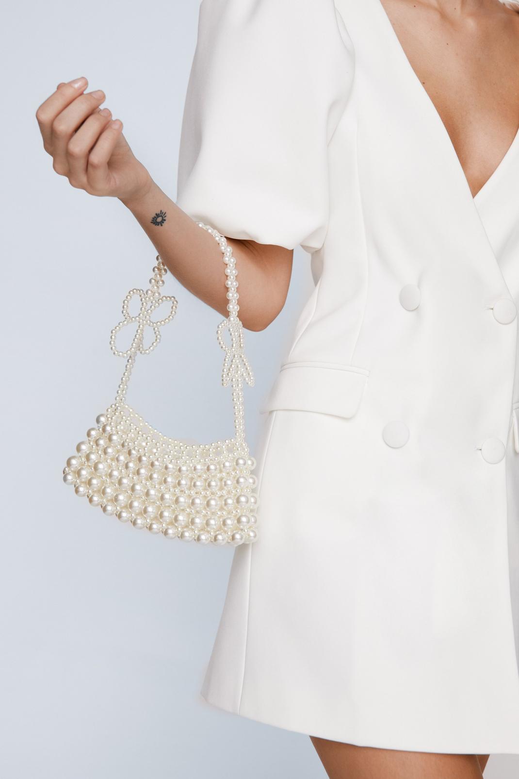 Cream Pearl Beaded Butterfly Strap Bag image number 1