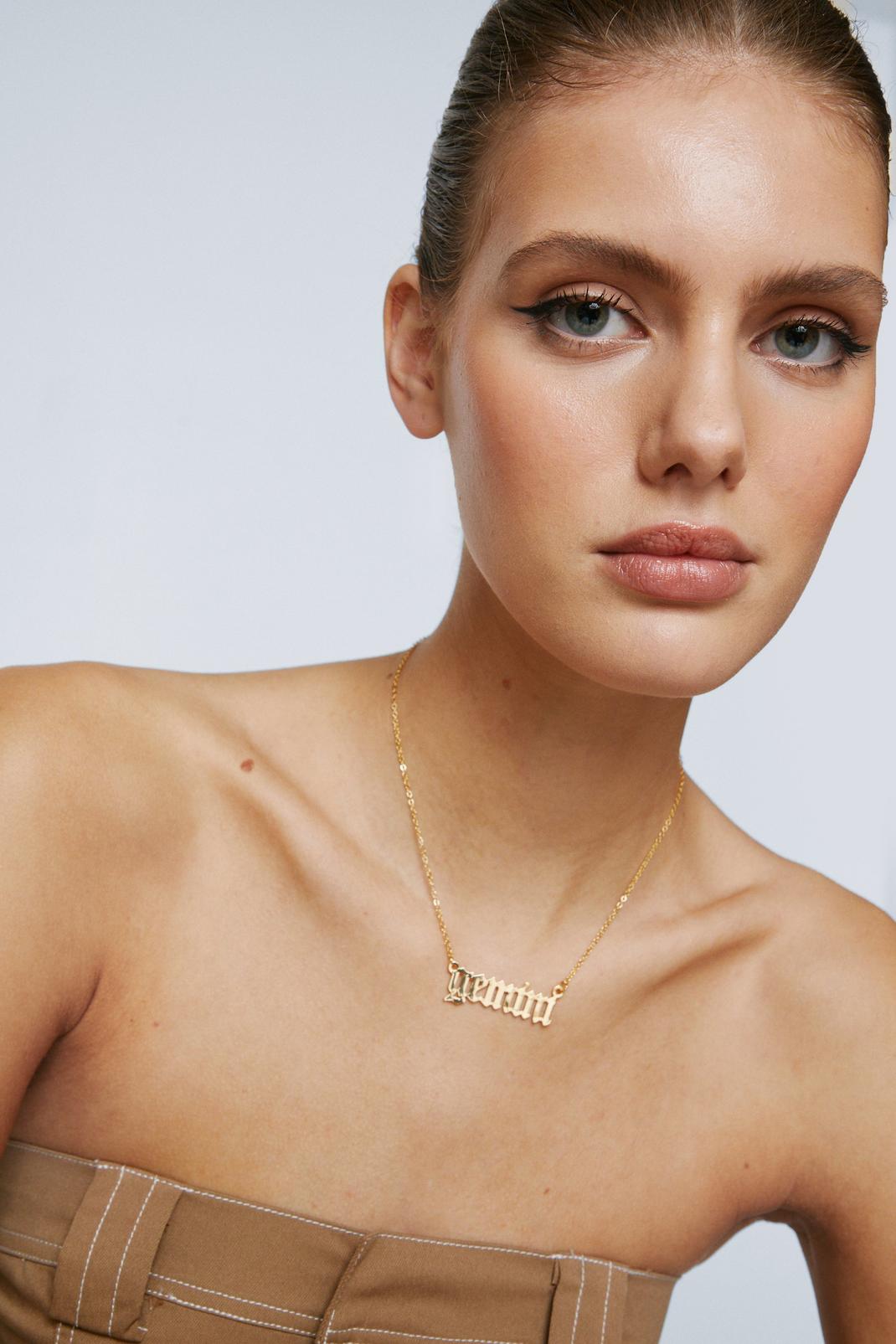 Gold Gemini Necklace image number 1