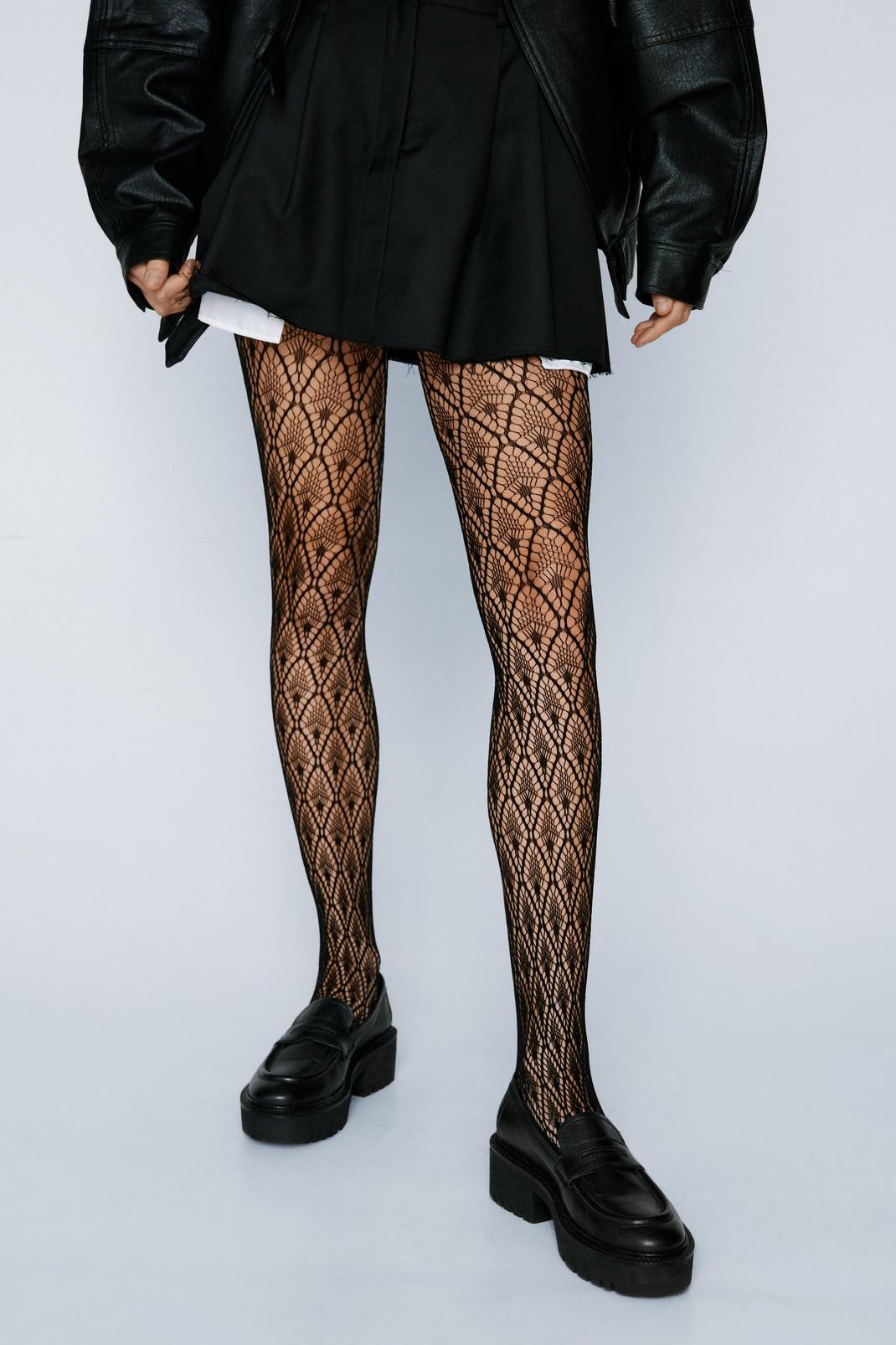 Black Peacock Feather Patterned Fishnet Tights image number 1