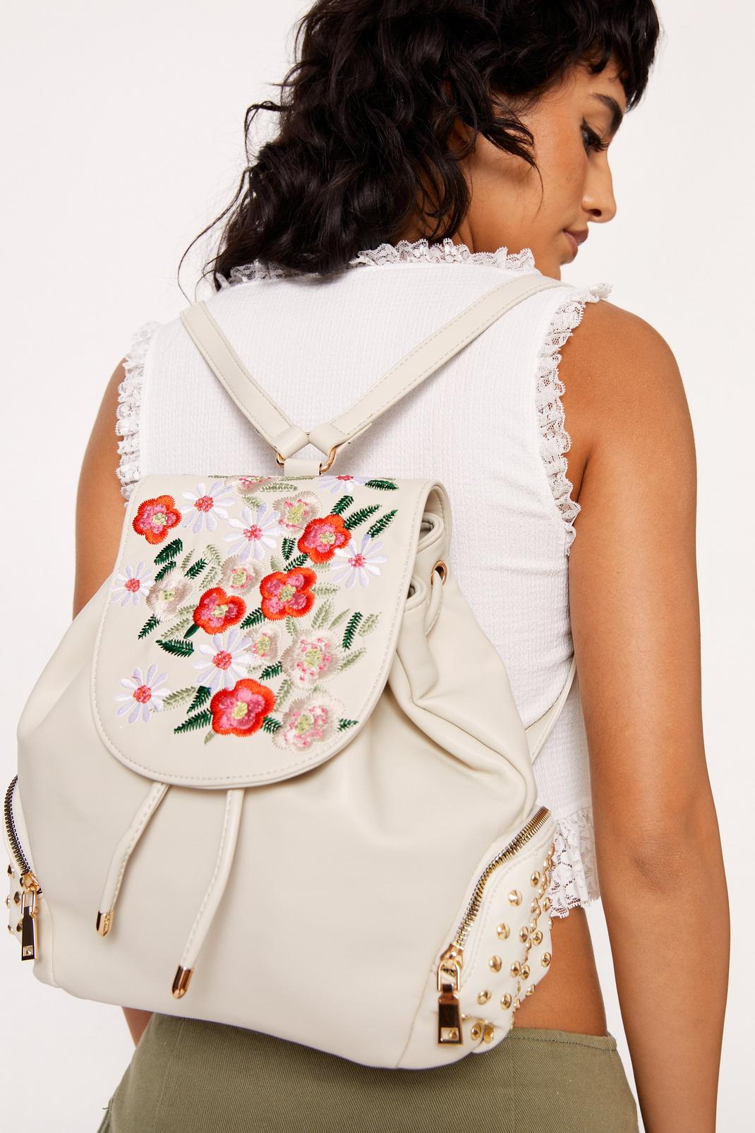 Cream Floral Embriodery & Studded Backpack image number 1