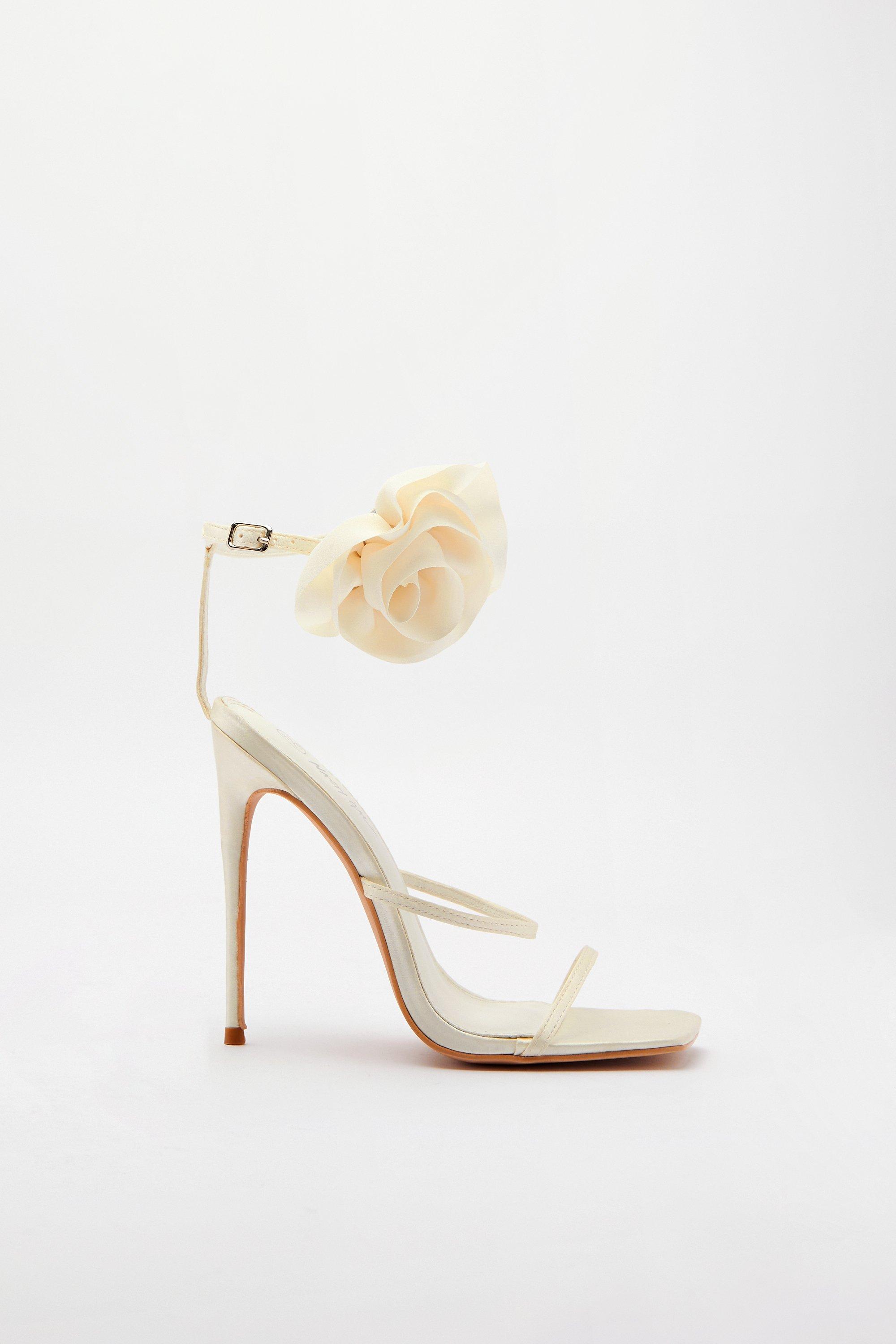 Heels with best sale flowers on them