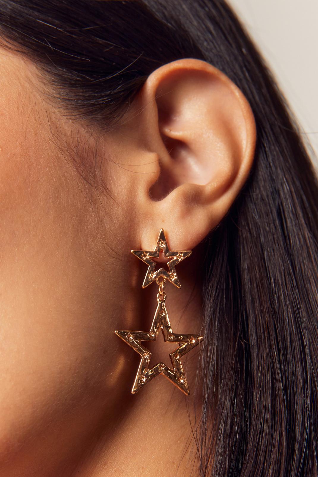 Gold Double Star Drop Earrings image number 1