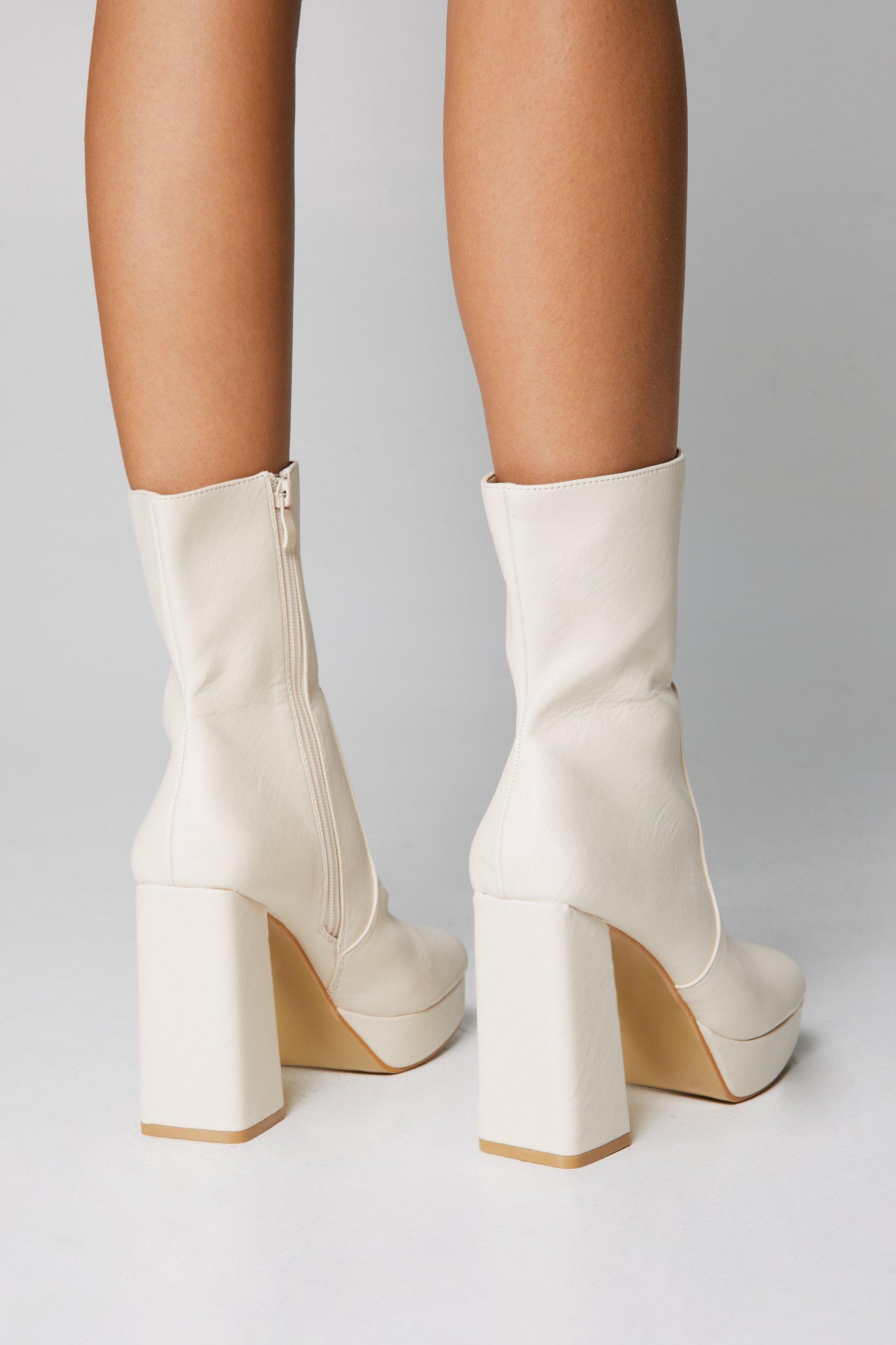 Cream store platform boots