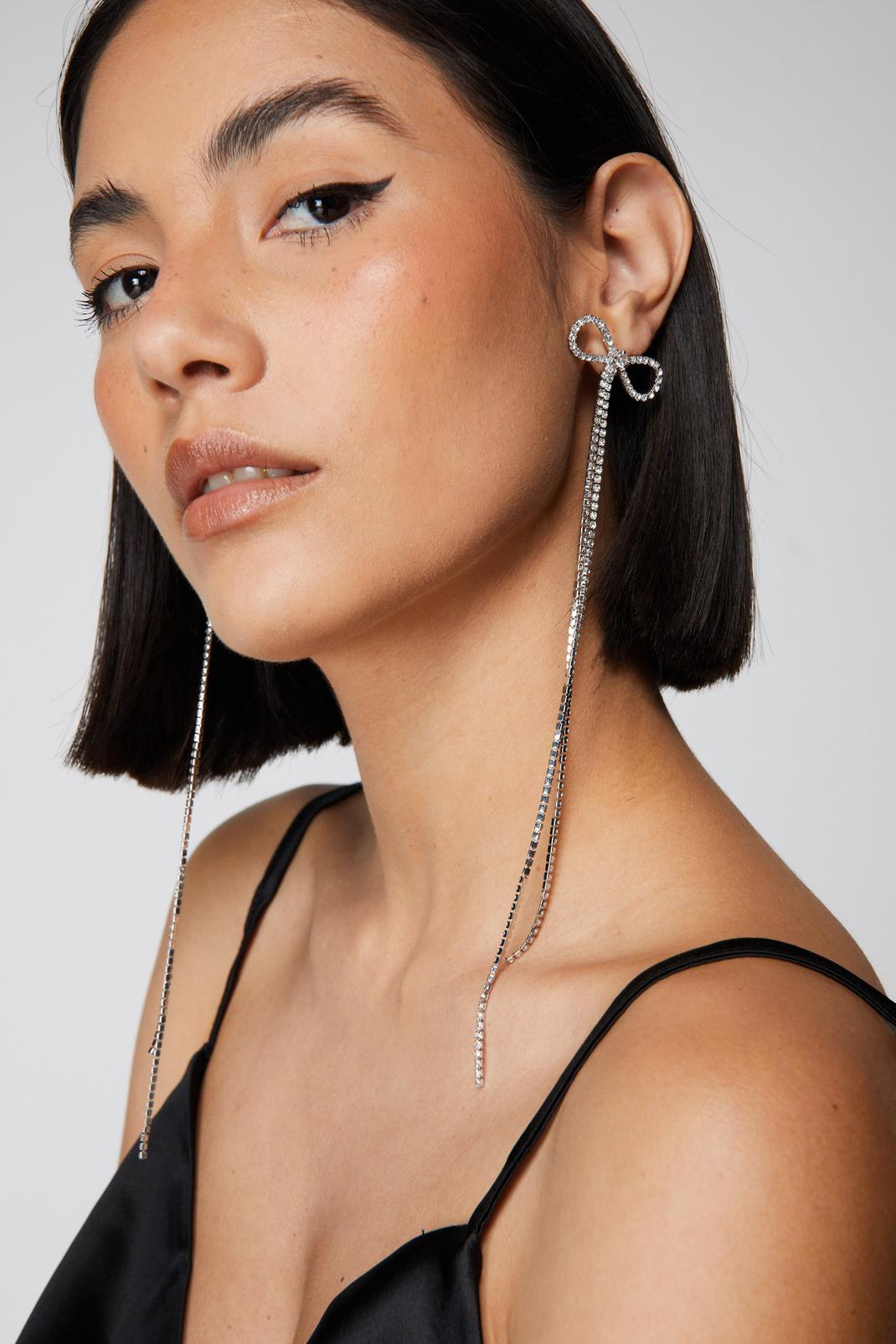 Silver Diamante Bow Tassel Earrings image number 1