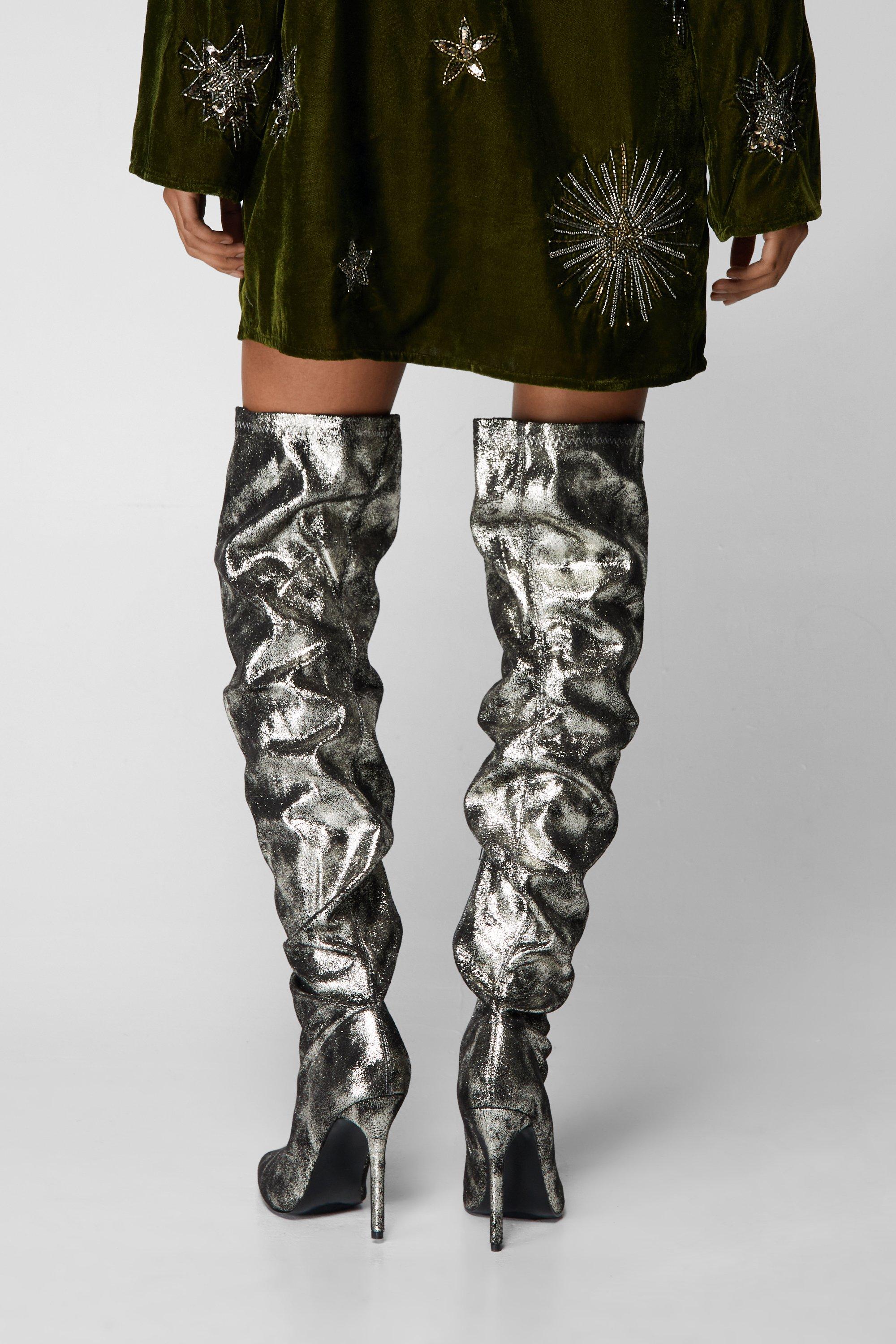 Silver metallic thigh store high boots