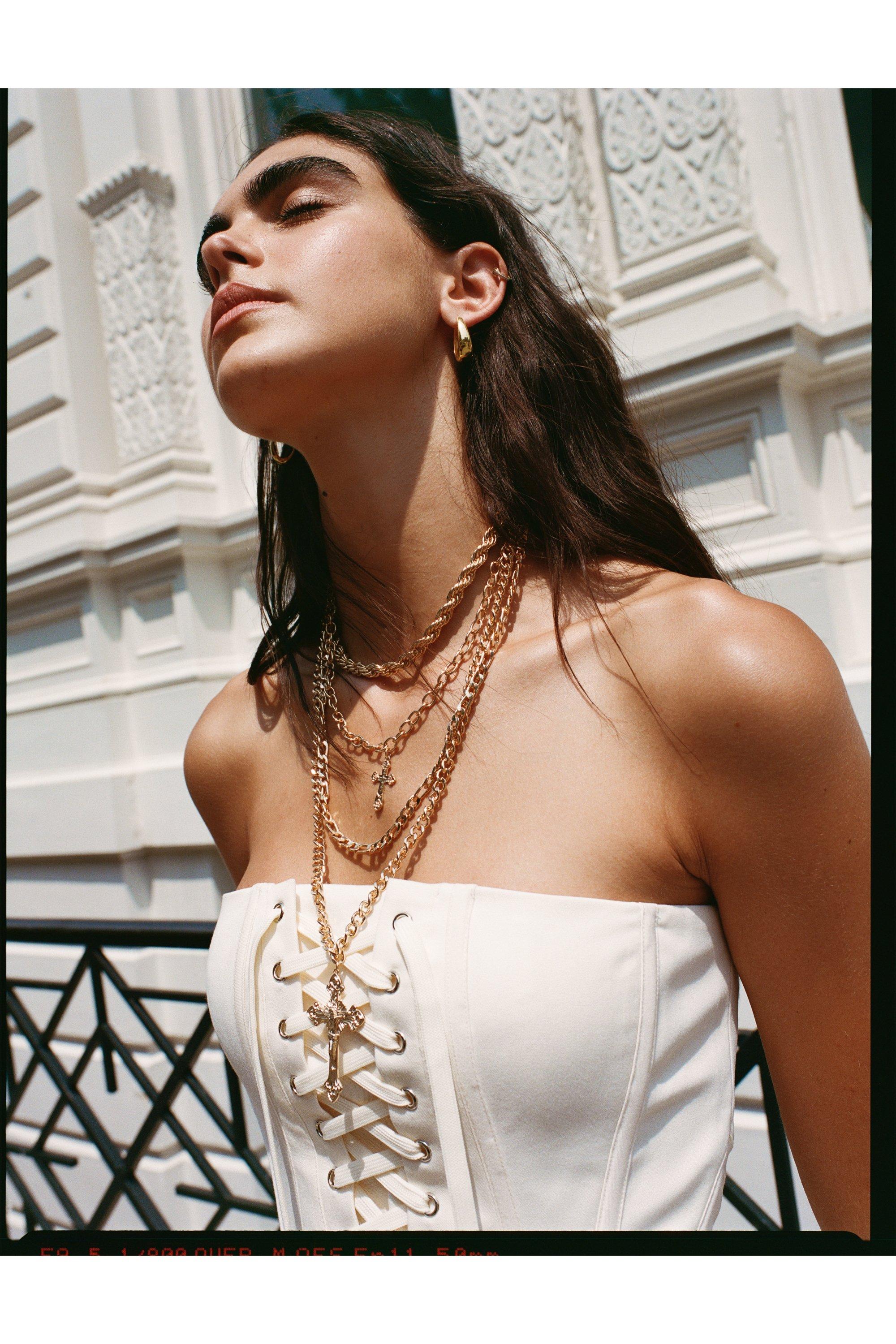 Gold cross layered necklace hotsell
