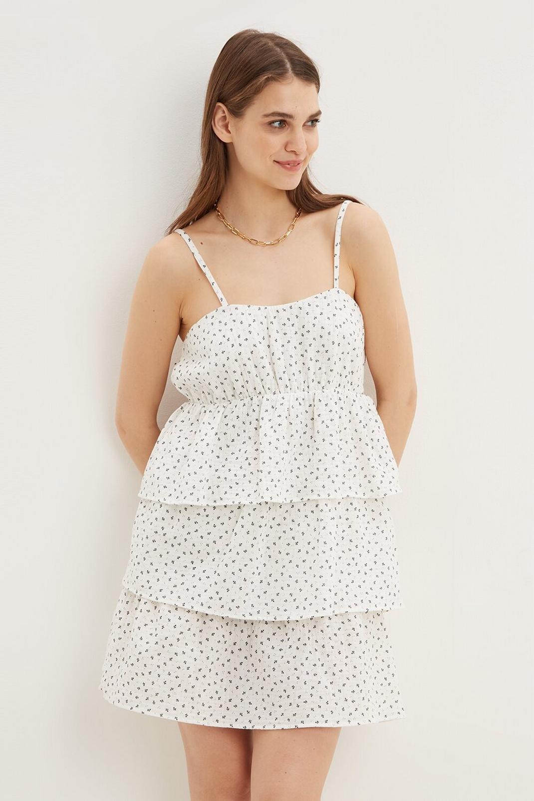 Ivory Ditsy Print Tiered Strappy Mini Dress image number 1