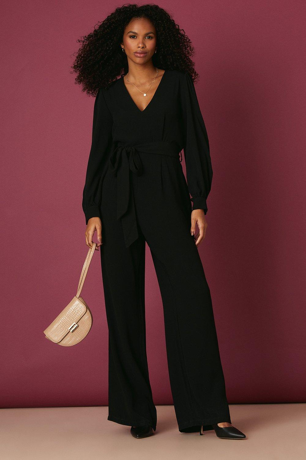 black jumpsuit with holes